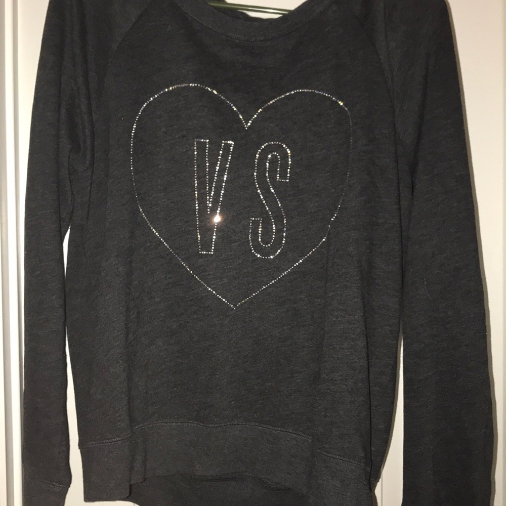 A Victoria’s Secret gray sweatshirt